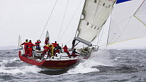 Snowlion downwind with its spinnaker under grey skies during the Onion Patch Series 2006 in Newport, Rhode Island, USA.