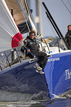 Open 60 "Artemis Ocean Racing" with skipper Brian Thompson on the bow.