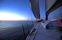 Maximus just after dawn towards the rising sun during the 2006 Newport to Bermuda Race.
