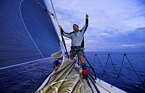 Bowman signalling back to the crew that the jib sail onboard "Maximus" is ready to be hoisted, 2006 Newport to Bermuda race.