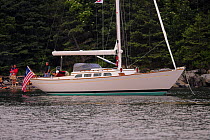 A Morris 42 anchored by the shore, Newport, Rhode Island, USA.