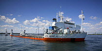 Yacht transport ship partally sunk to allow yachts to board, Newport, Rhode Island, USA.