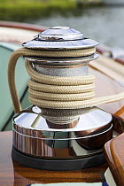 Loaded winch aboard a classic cruising yacht. Rhode Island, USA.