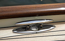 Detail of a cruising yacht metal cleat. Rhode Island, USA.