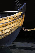 Bow of a clinker built wooden boat moored at the Newport Wooden Boat Show, Rhode Island, USA.