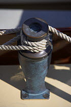 Winch detail aboard a wooden boat at the Newport Wooden Boat Show, Rhode Island.