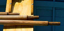 Oar handles on thwarts of a clinker boat at the Newport Wooden Boat Show, Rhode Island.