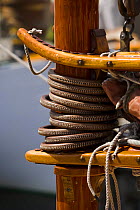 Leather-covered mast hoops on sailing boat at the Newport Wooden Boat Show, Rhode Island.