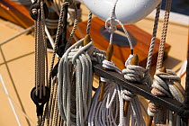 Traditional block and tackle on wooden yacht "Phoebe" at the Newport Wooden Boat Show, Rhode Island.