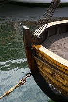 Old clinker boat moored at the Newport Wooden Boat Show, Rhode Island.