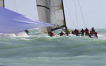Spinnaker flying during a one-design classes race, Key West Race Week 2006, Florida, USA.