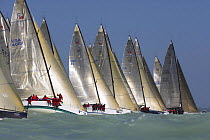 One-design classes lining up at the start line for a race, Key West Race Week 2006, Florida, USA.