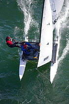 Trapezing while sailing during the Hobie 16 Nationals, Narragansett, Rhode Island, USA.