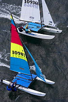Trapezing while racing during the Hobie 16 Nationals, Narragansett, Rhode Island, USA. September 2006.