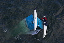 Capsized catamaran during the Hobie 16 Nationals, Narragansett, Rhode Island, USA. September 2006.