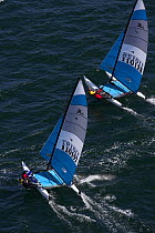 Trapezing while racing in the Hobie 16 Nationals, Narragansett, Rhode Island, USA. September 2006.