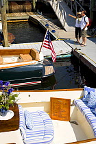 Boats docked for the annual Newport Boat Show, Rhode Island, USA. September 2006. Hinckley Picnic Boat in the foreground.