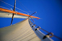 Mast and sails of 12m yacht ^Gleam^ sailing off Newport, Rhode Island, USA. September 2006.