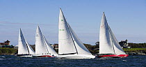 A fleet of 12m yachts racing in Narragansett Bay, Newport, Rhode Island, USA. October 2006.