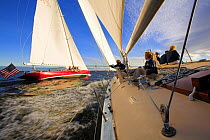 Racing onboard 12m Weatherly with American Eagle to leeward in Narragansett Bay, Newport, Rhode Island, USA. October 2006.