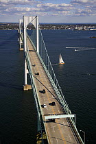 The wooden hulled Van Ki Pass sailing in front of Newport Bridge, Rhode Island, USA. October 2006.