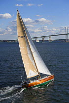 The wooden hulled Van Ki Pass sailing in front of Newport Bridge, Rhode Island, USA. October, 2006.