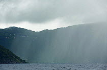 Heavy rain falling over the sea, British Virgin Islands, Caribbean. December 2006.