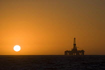 Sunset behind oil rig "J.W.McLean". September 2006.