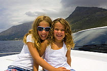 Mr. Chuck Schoninger's two daughters cruising the Tirrenian sea on board his brand new Pershing 62, Maratea, Italy.