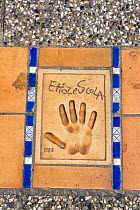 Hand print of Ettore Scola, Italian screenwriter and film director, on the Croisette in front of the Cinema Festival Palace, Cannes, France.