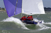 J80 "Savage Sailing", owned by Liz Savage race downwind in the gusty conditions in the J80 Nationals, an event organized by the Royal Southern Yacht Club held in the Solent, UK, 2006.