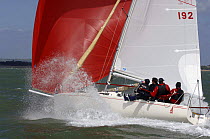 Skipper Steve Andrews races his J80 "Jet Set" in the J80 Nationals, an event in the Solent organized by Royal Southern Yacht Club, UK, 2006.