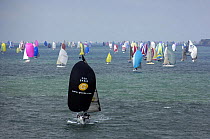 1799 Yachts take part in the annual race around the Isle of Wight, the fleet of spinnakers pass St Catherines Point, UK, June 23, 2007.