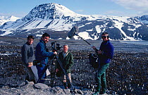 Film  crew film on location in South Georgia for BBC television series Life in the Freezer ,1992. Alastair Fothergill producer (left) and presenter Sir David Attenborough