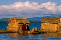Uros (floating reed islands) with Totora reed boats Lake Titicaca Bolivia