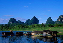 Boat homes of Cormorant fisherman Li river Guangxi China
