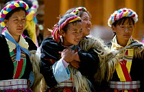 Naxi girls in traditional dress Yunnan province, China