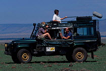Simon King being filmed on location for BIG CAT DIARY Masai Mara NR Kenya E Africa