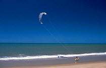 Kite surfer on beach Queensland Australia